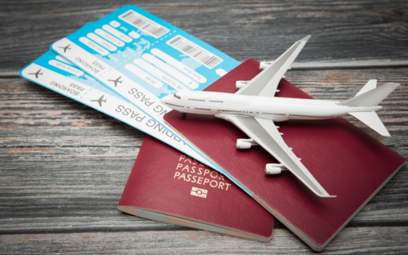 Travel documents with plastic white plane on top