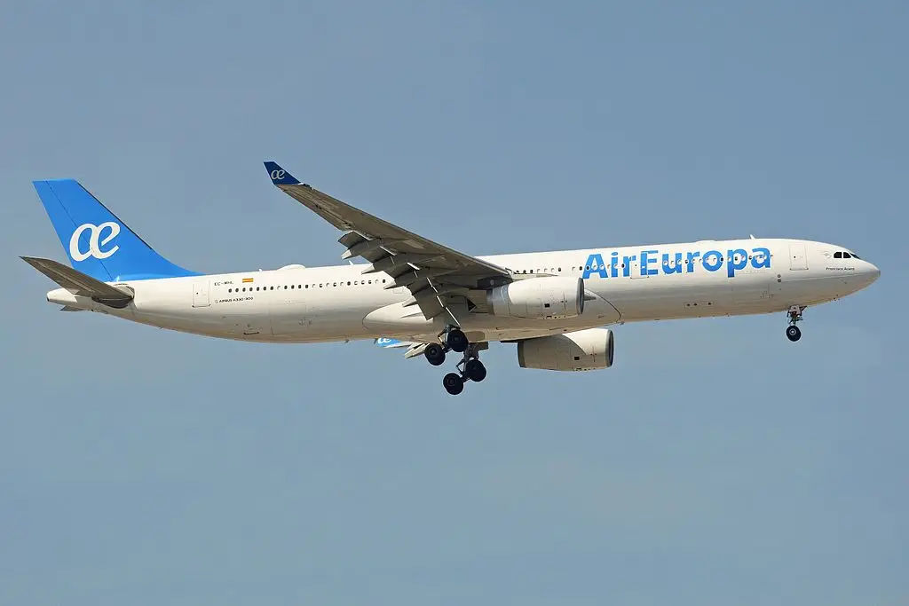Air Europa passenger airplane preparing to land under clear sky