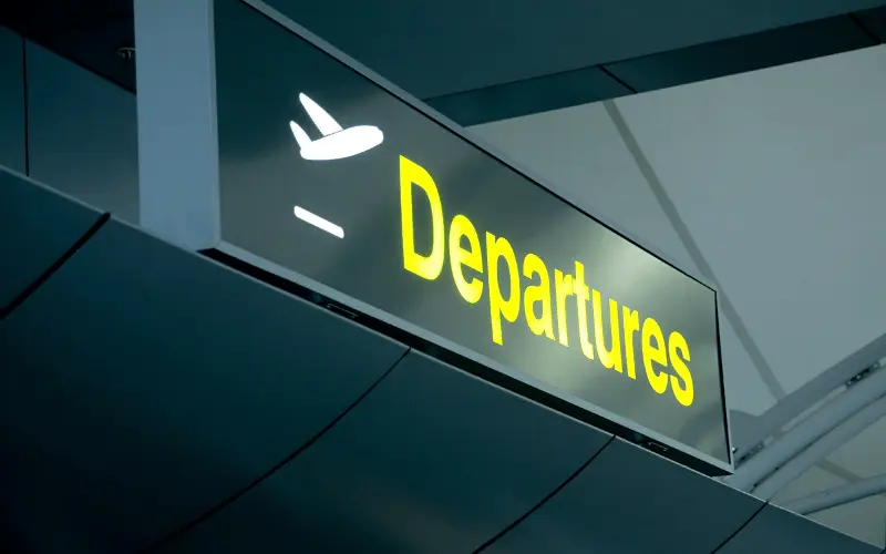 Airport departures sign for travelers flying from terminal