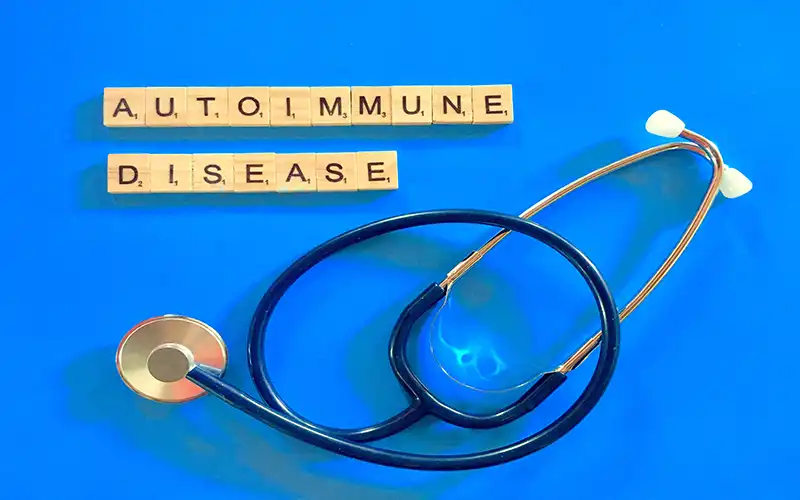 stethoscope with scrabble letters spelling autoimmune