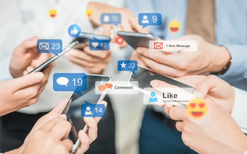 People using smartphones with social media notifications and engagement icons
