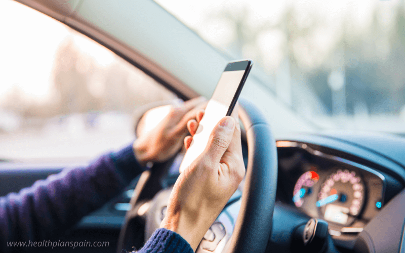 Driver using a mobile phone