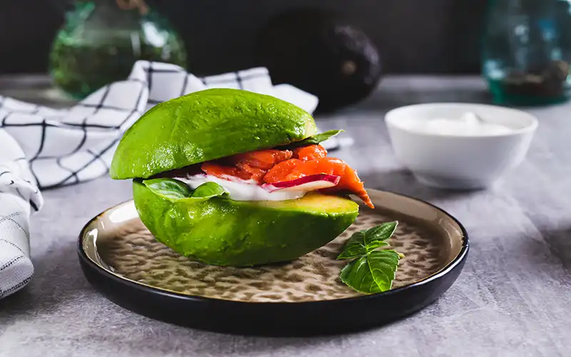 Avocado Keto Burger with fish yoghurt and radishes