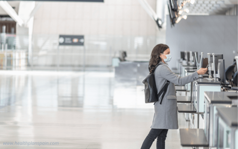 Traveller at airport check-in