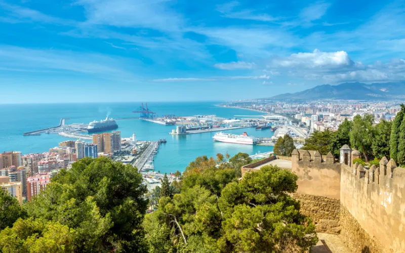 Aerial view of Malaga city and harbor on a sunny day in southern Spain