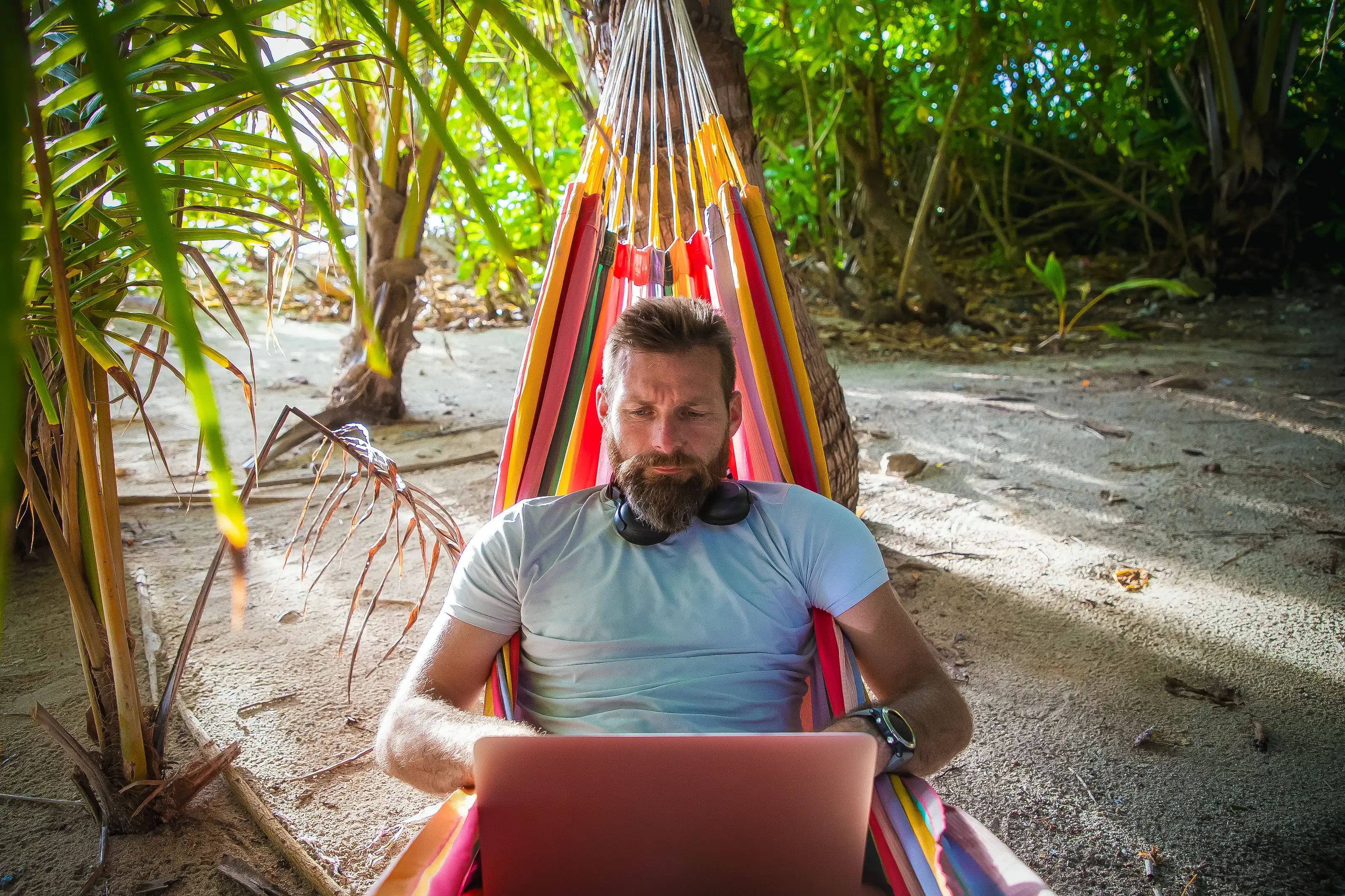 digital nomad working in peace on beach