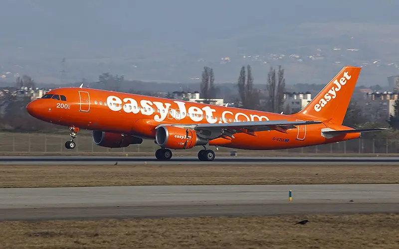 EasyJet airplane landing on runway at European airport