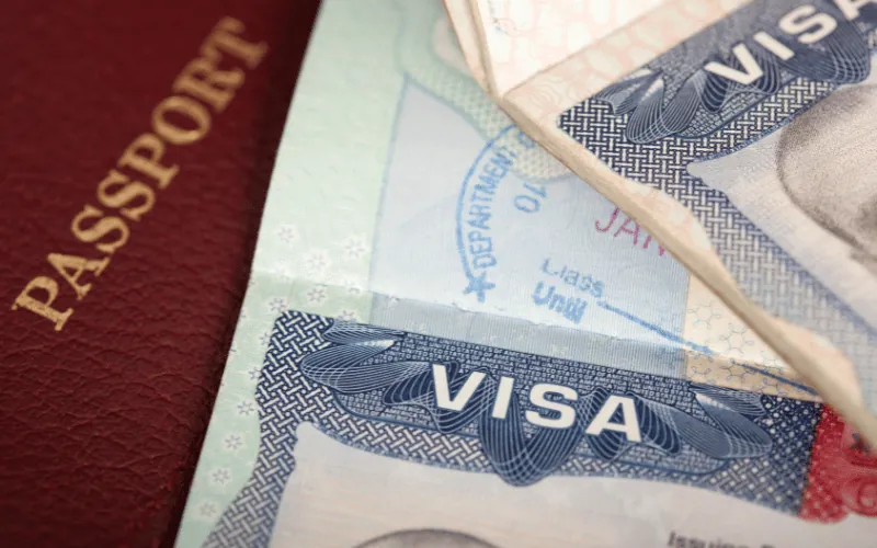 Close-up of passport and approved visa documents for international travel