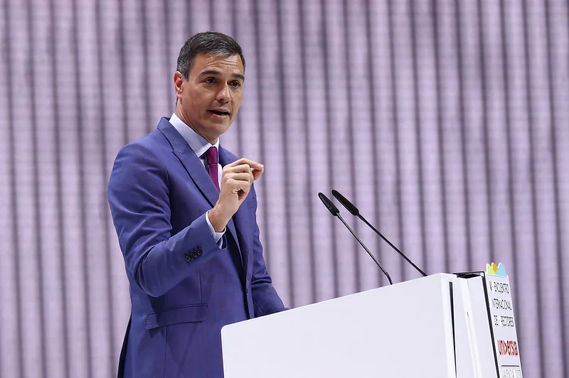 Spanish prime minister speaking at international tourism conference podium