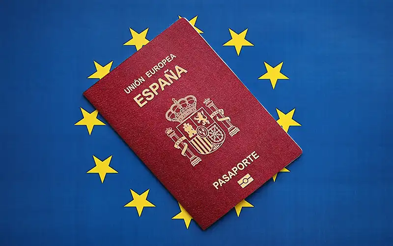 Spanish passport on Euro flag