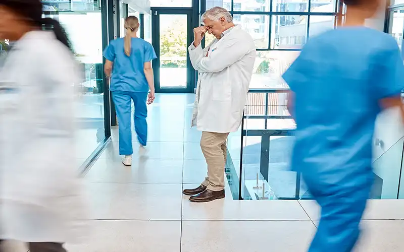 doctor contemplating tomorrows strike action