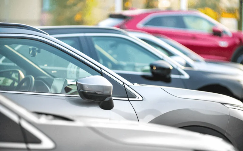 Parked modern cars in Spain under bright daylight