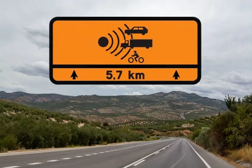 Spanish road with orange traffic sign