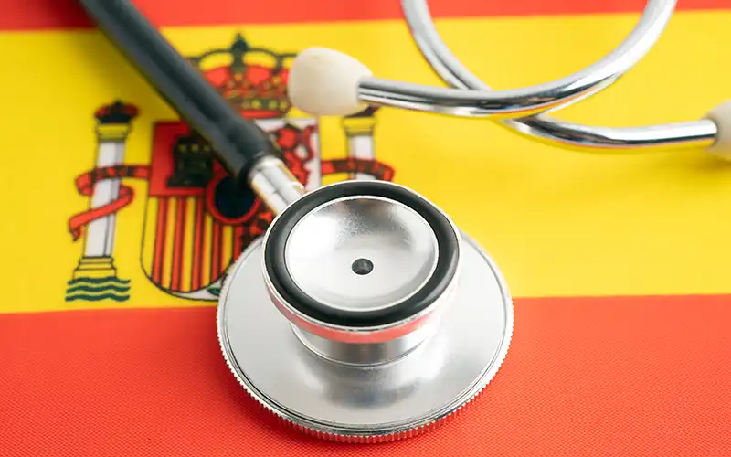 Spain flag with stethoscope
