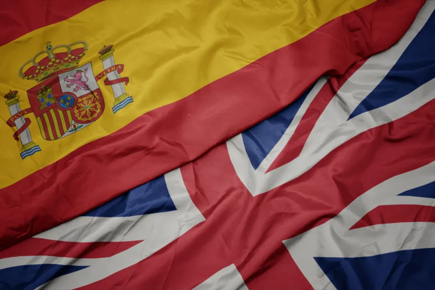 Flags of Spain and United Kingdom symbolising expat connection and relocation between both countries